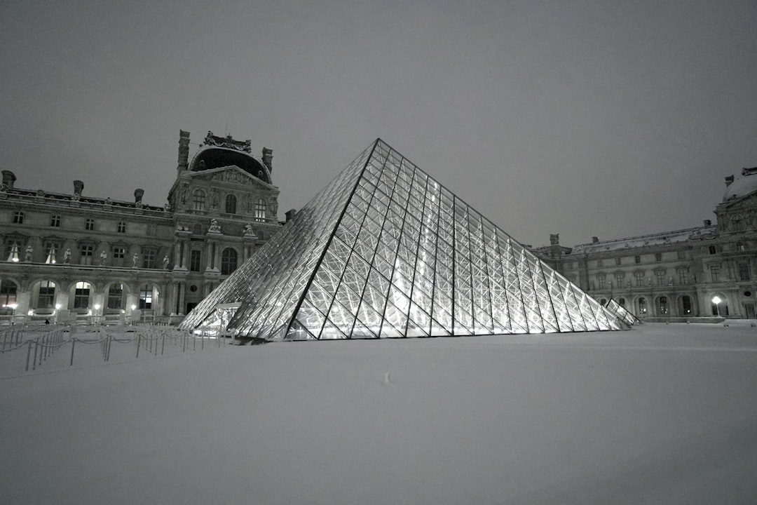 black and white building under white sky