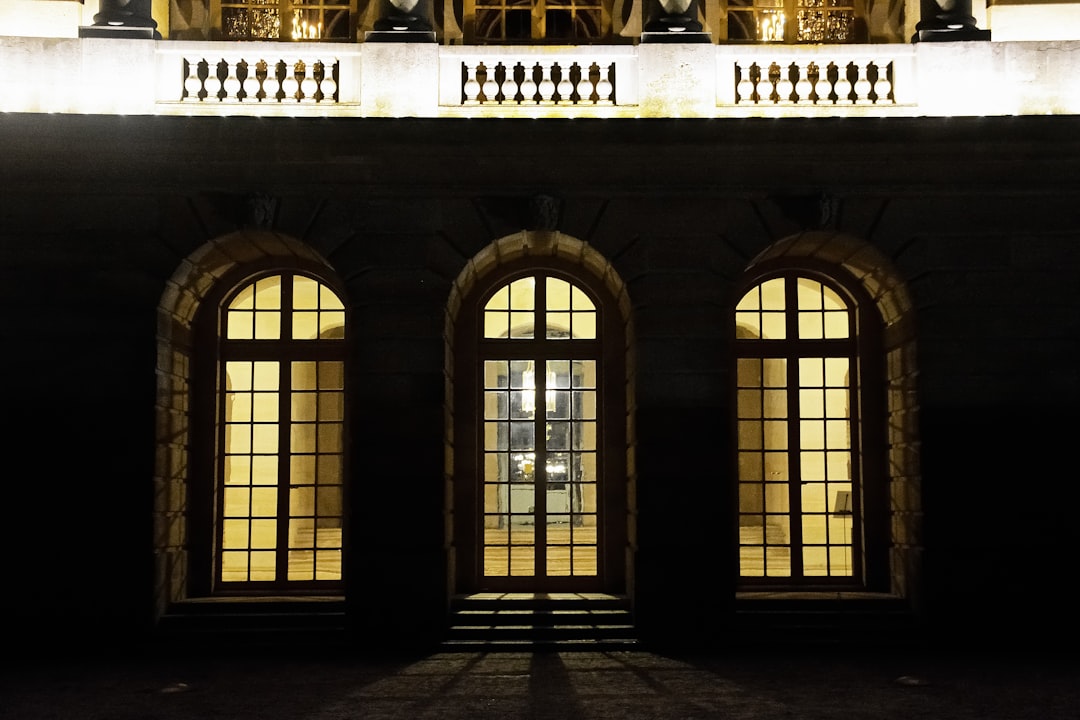 brown wooden framed glass window