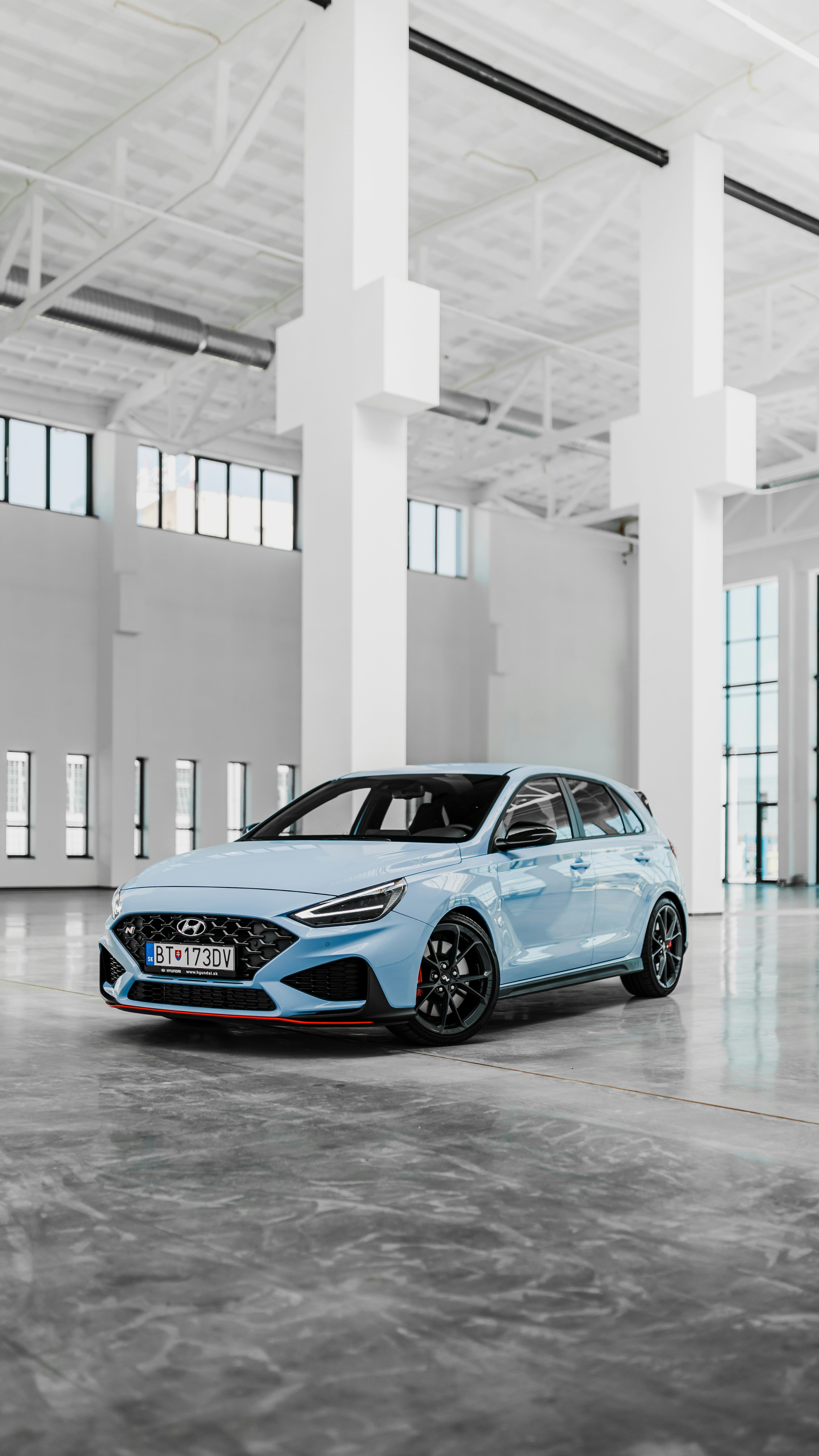 woman wearing yellow long-sleeved dress under white clouds and blue sky during daytime