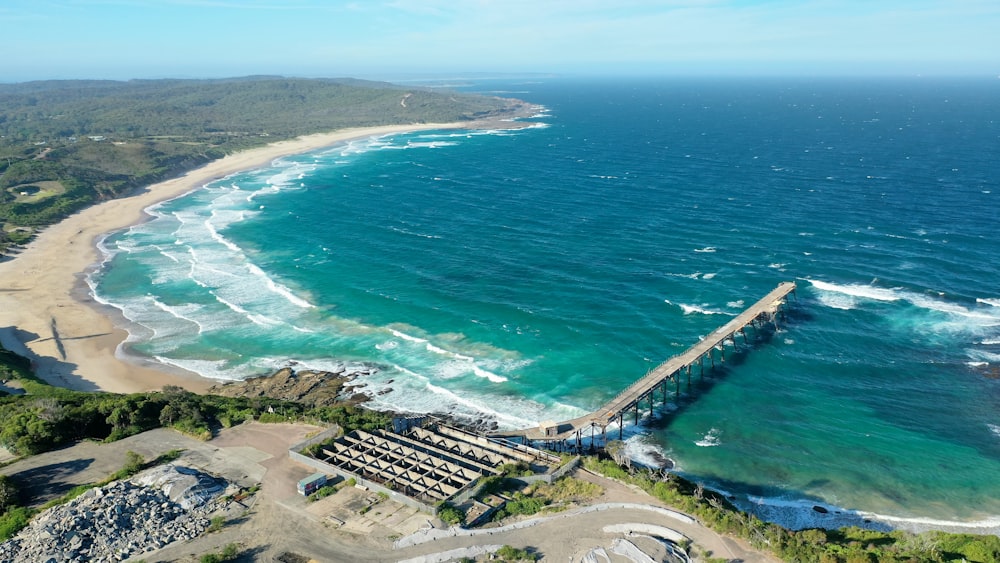 aerial view of city buildings near sea during daytime