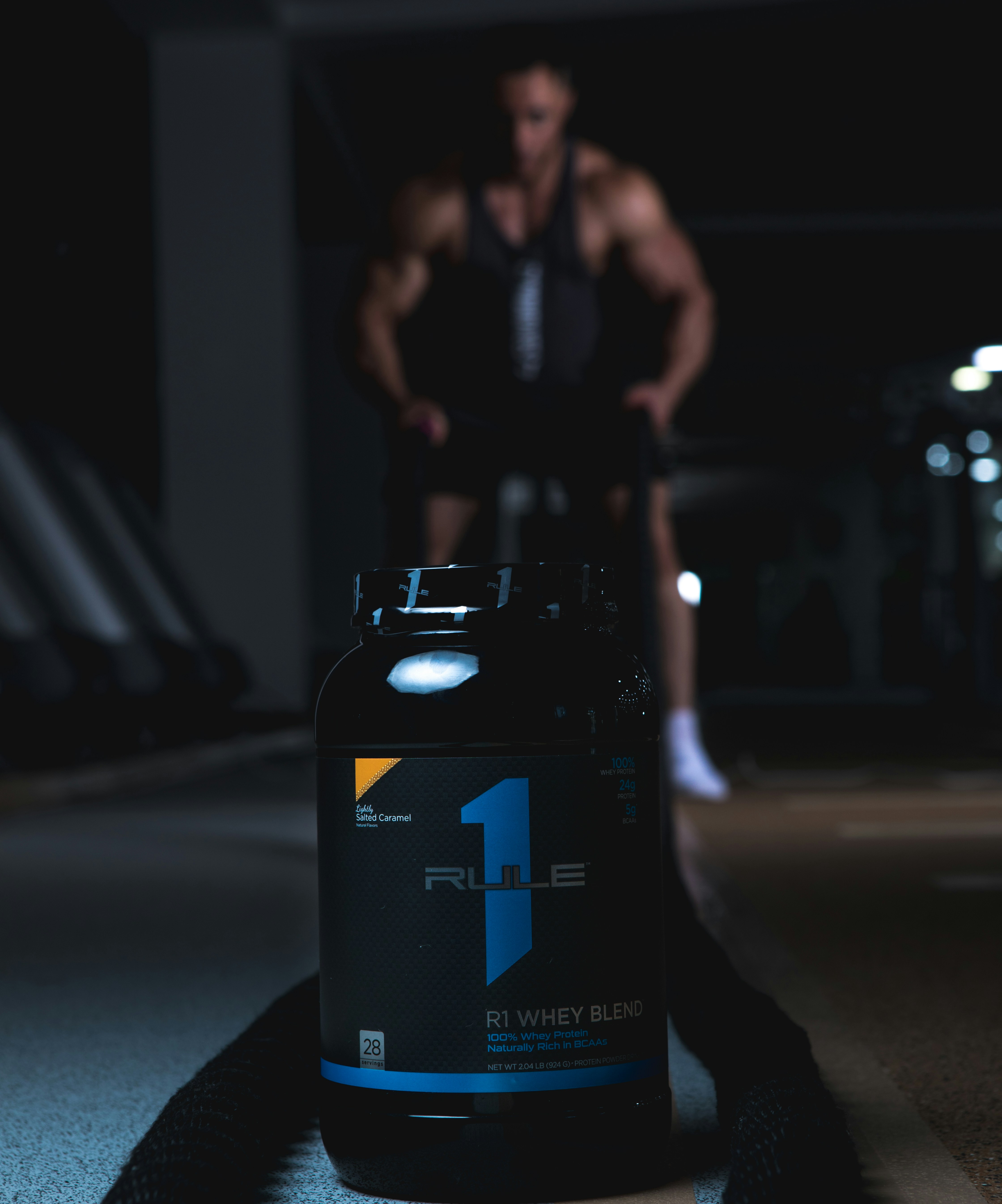 Black and white labeled bottle photo – Free Dark background Image on