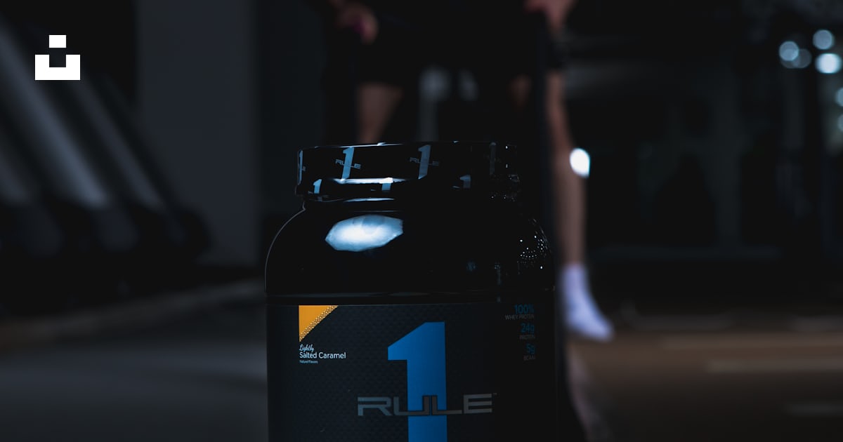 Black and white labeled bottle photo – Free Dark background Image on