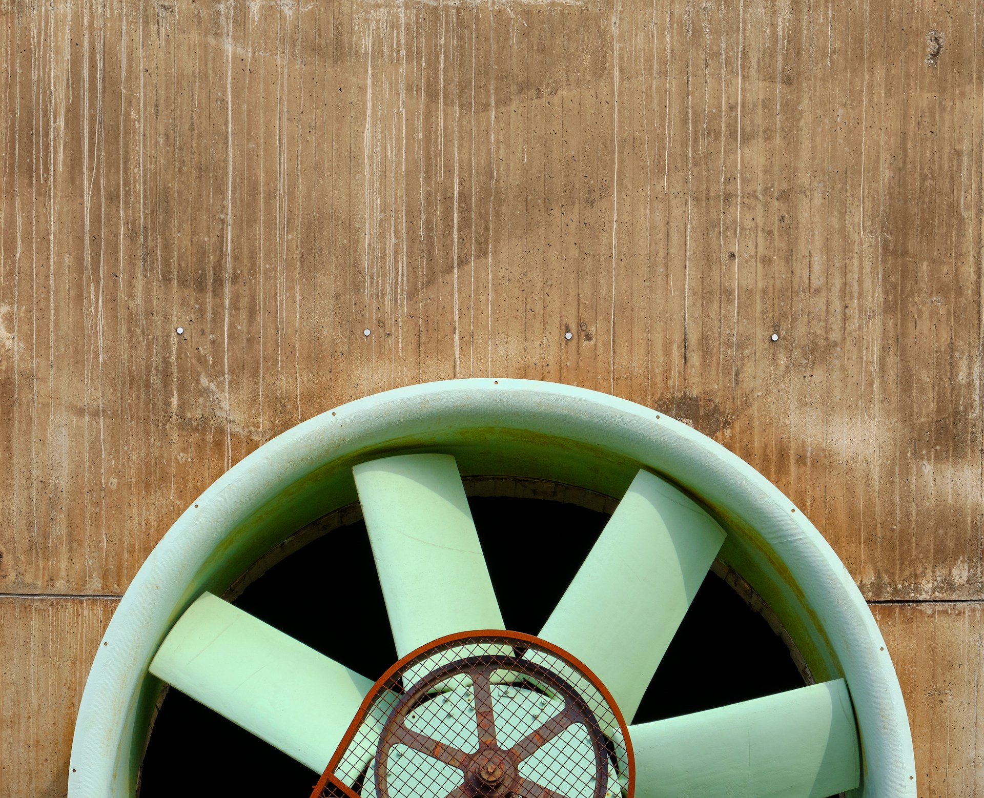 woman wearing yellow long-sleeved dress under white clouds and blue sky during daytime