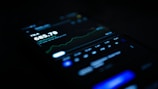 black android smartphone displaying 11 00