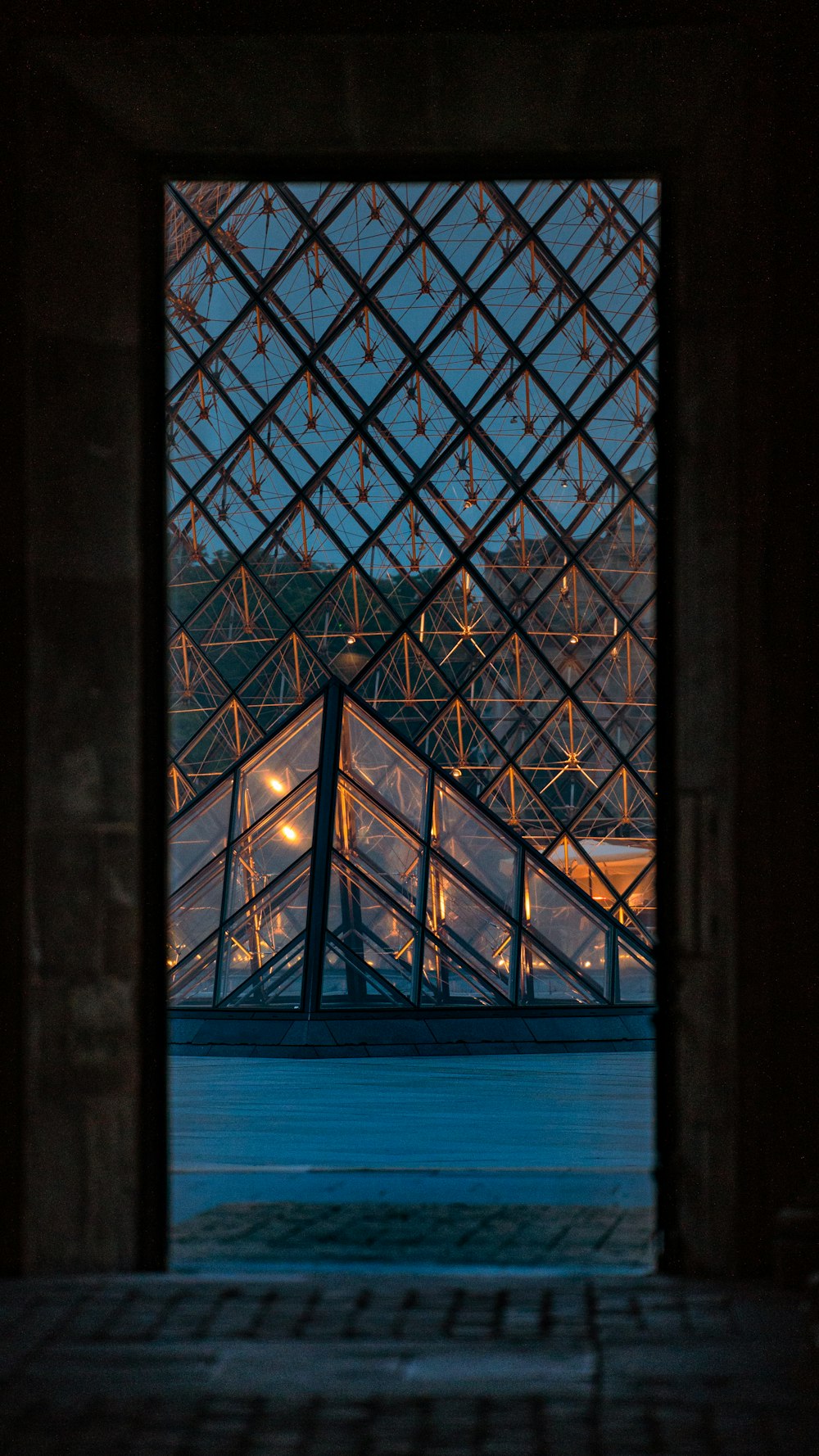 black framed glass window during night time