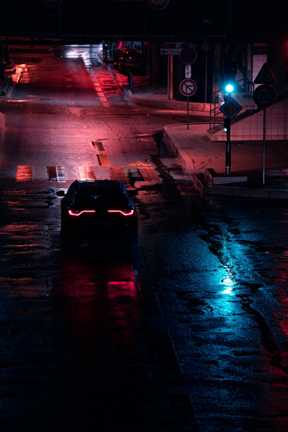 black car on road during daytime