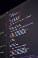 Close-up of code snippets illustrating declarative goal definitions in agenticscript.