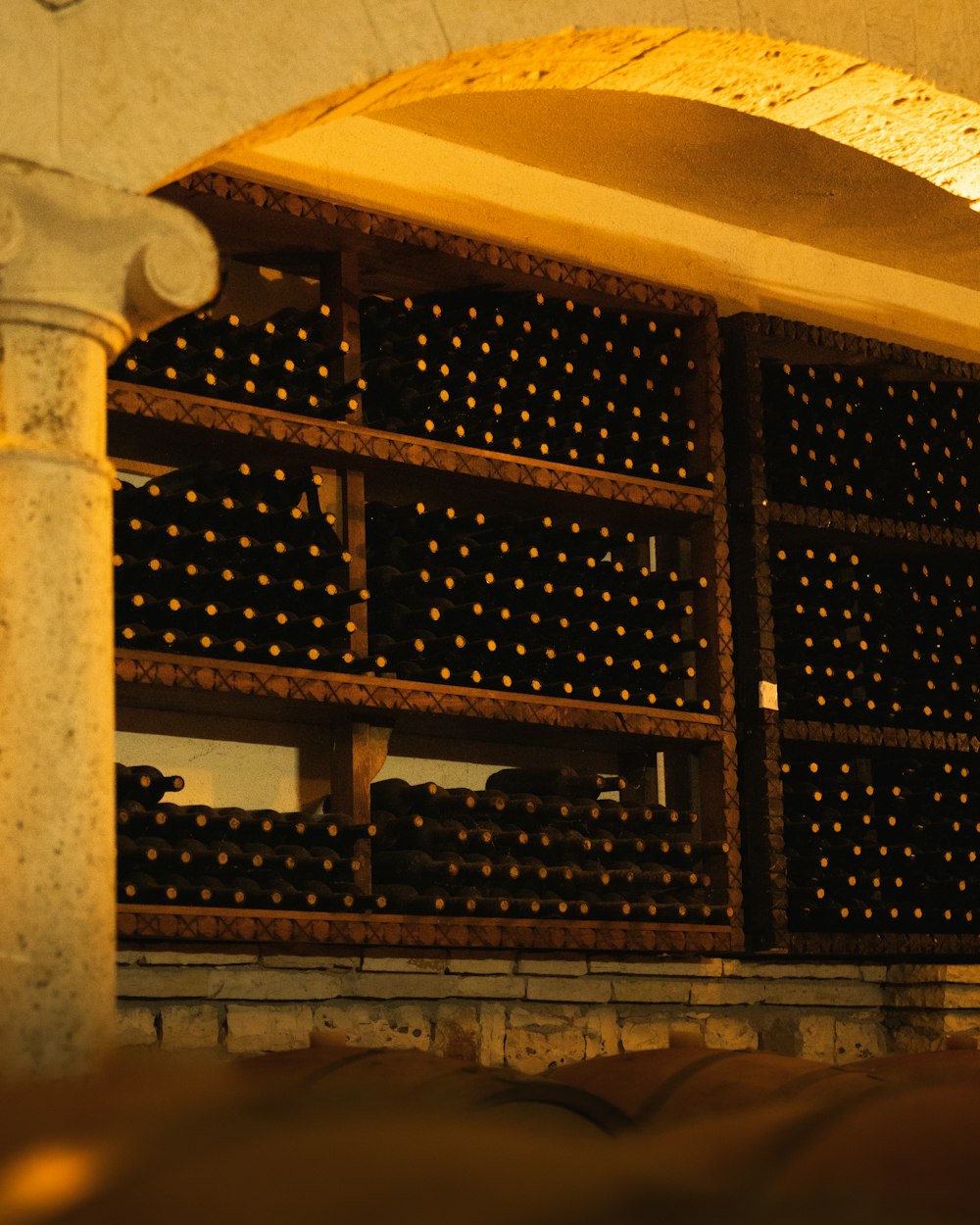 black wooden shelf with bottles