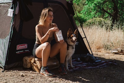 woman in brown tank top sitting on black car seat