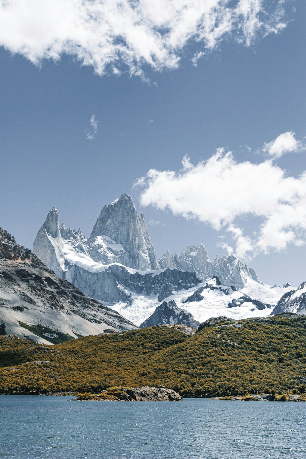 snow covered mountain under blue sky during daytime