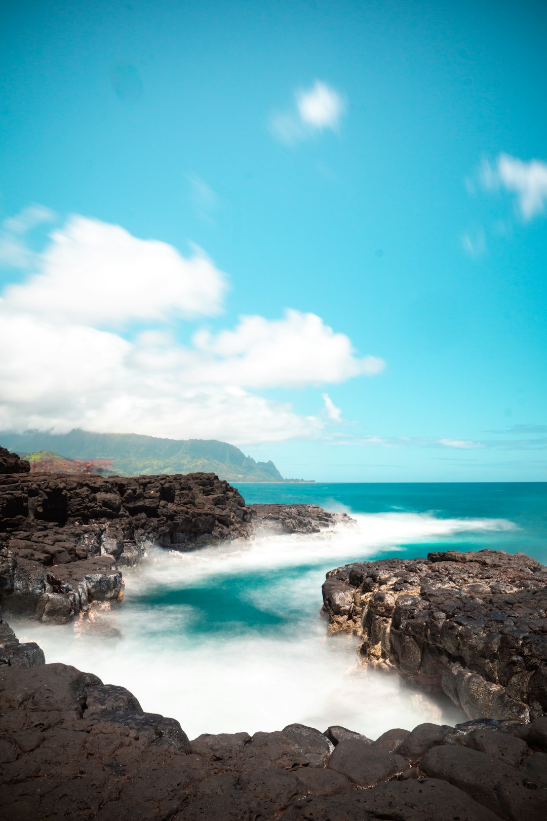 blue sky over rocky beach