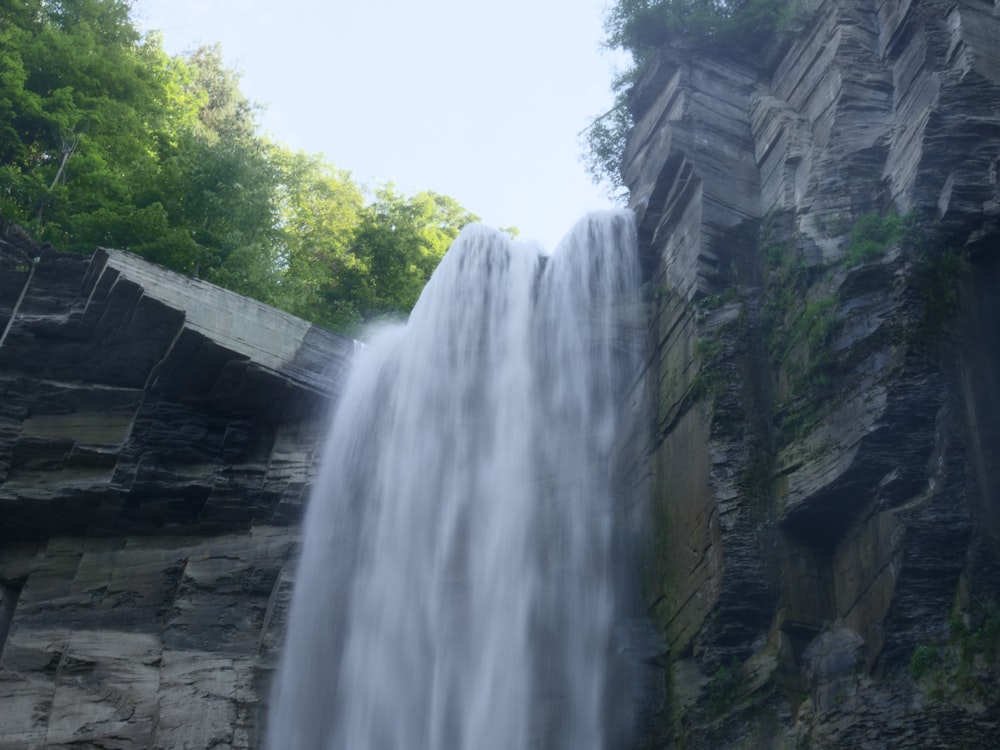 waterfalls in the middle of the forest