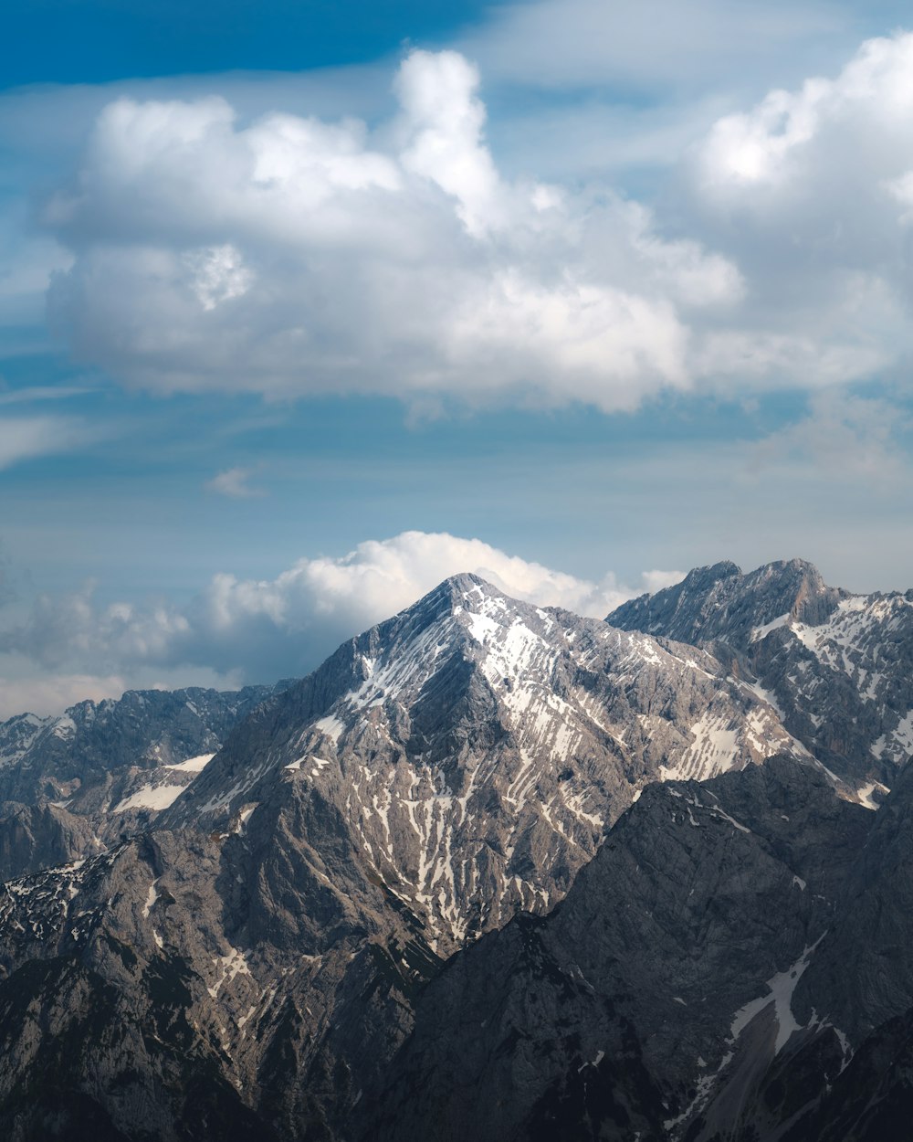 snow covered mountain under blue sky during daytime