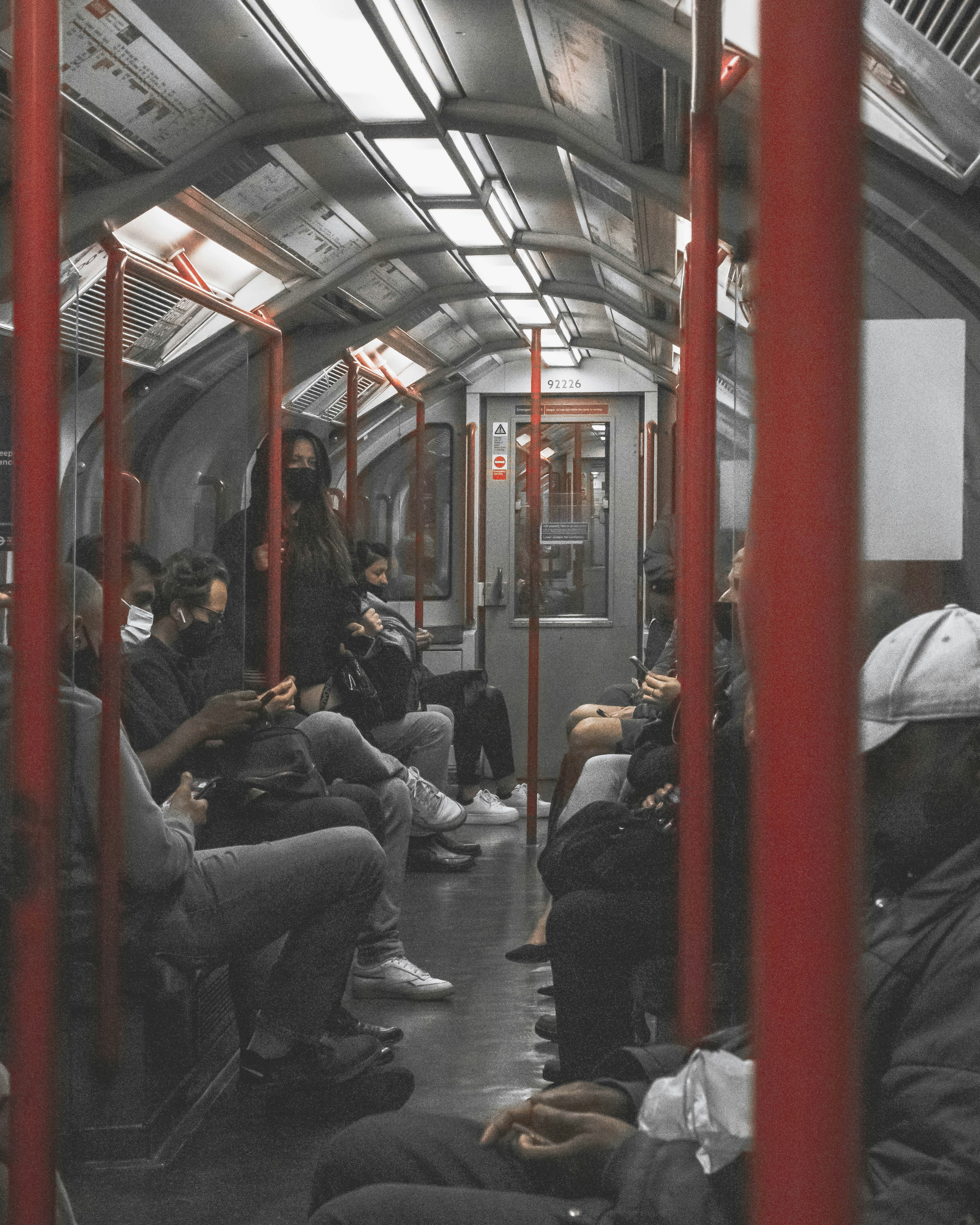 people sitting inside train during daytime