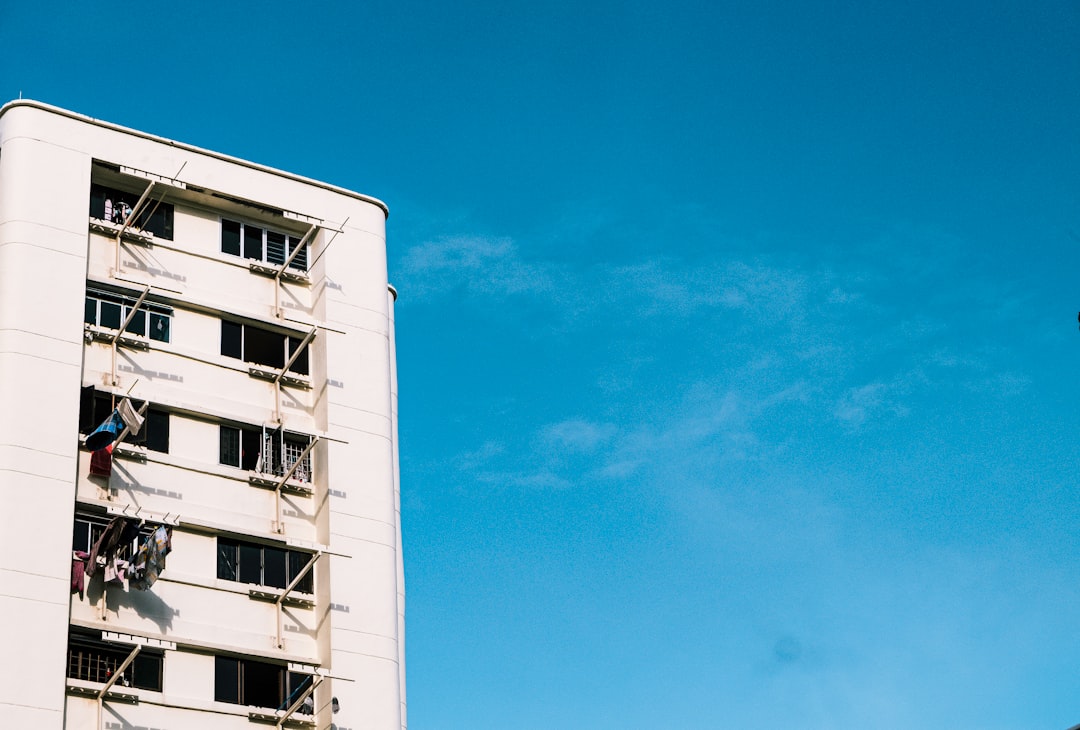 white concrete building under blue sky during daytime