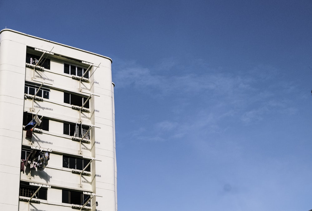 white concrete building under blue sky during daytime