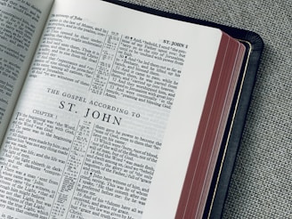 white book page on black textile