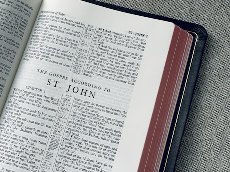 white book page on black textile