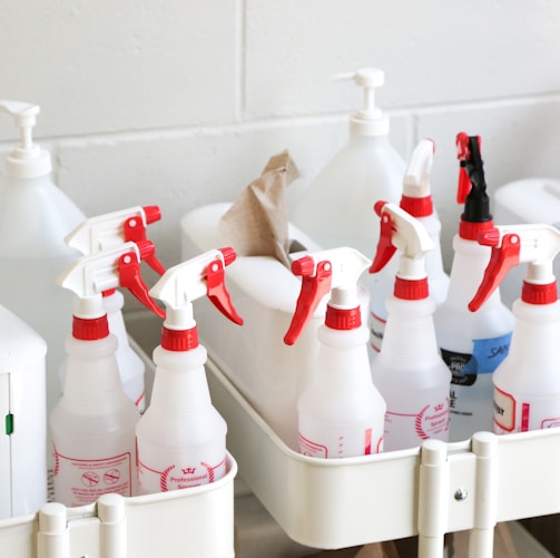 white plastic bottles on white plastic container