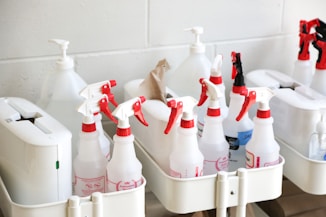 white plastic bottles on white plastic container