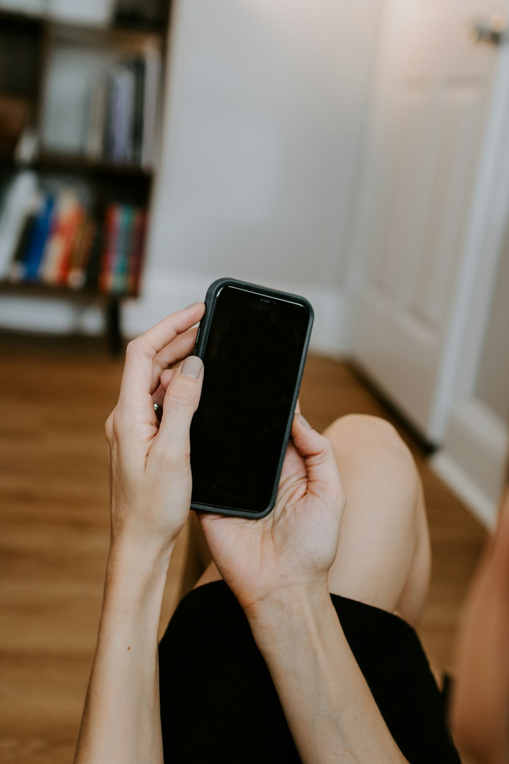 person holding black android smartphone