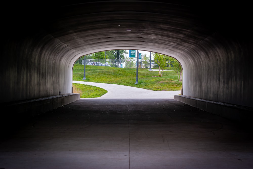 white concrete building near green grass field during daytime