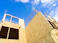 gray concrete building under blue sky during daytime