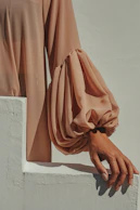 person in brown long sleeve shirt