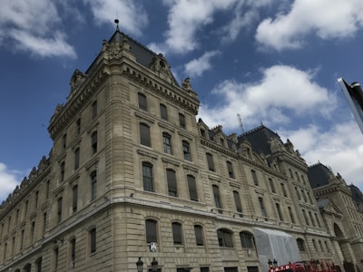 Wide shot of a historic building showcasing its renewed slate tiles.