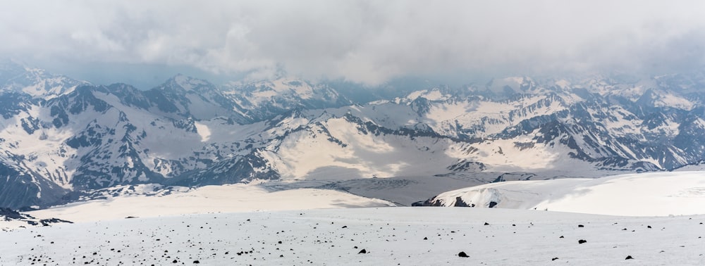 snow covered mountain during daytime