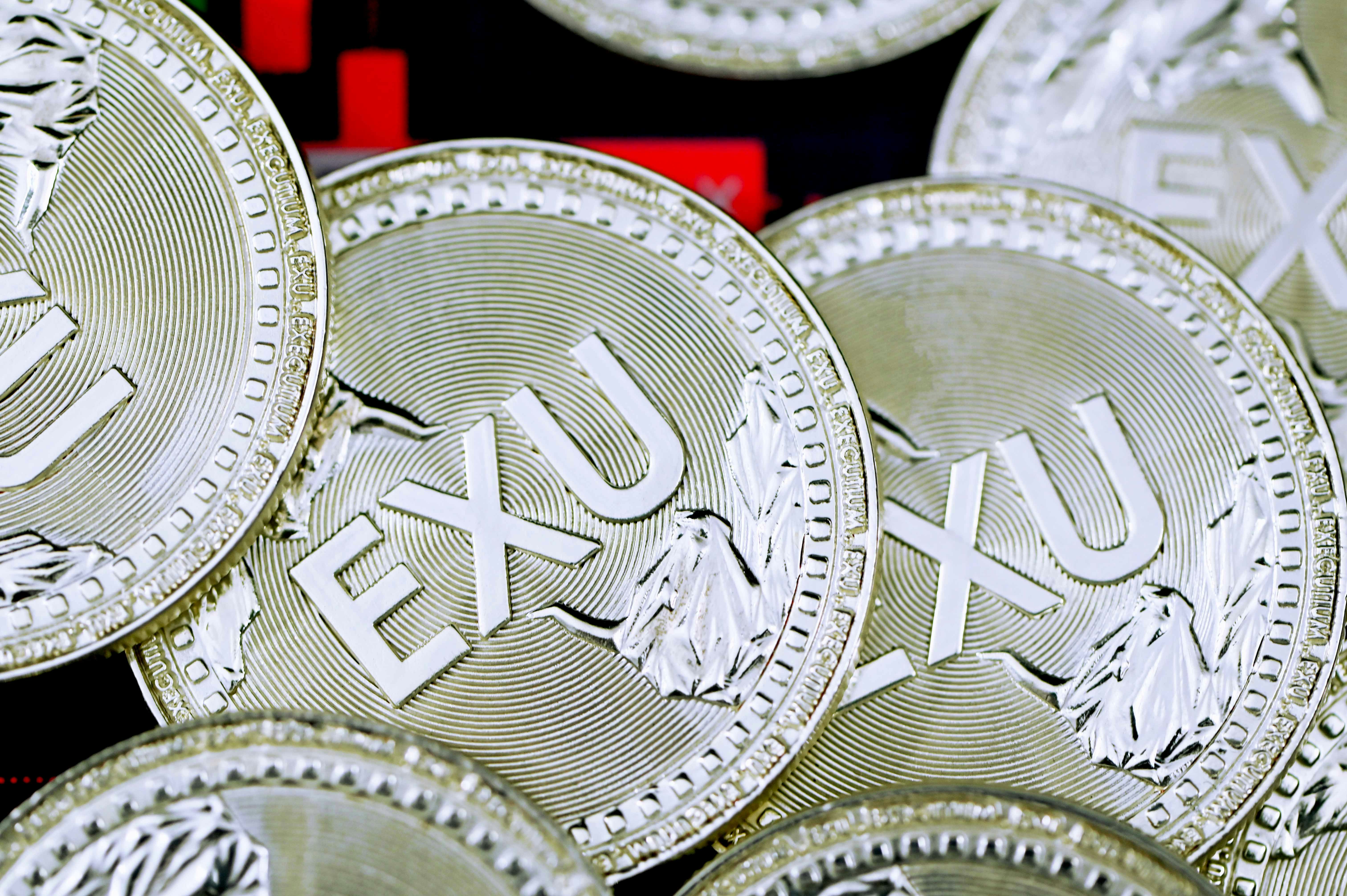 silver and gold round coin