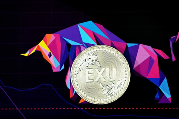 gold round coin on purple and pink striped textile