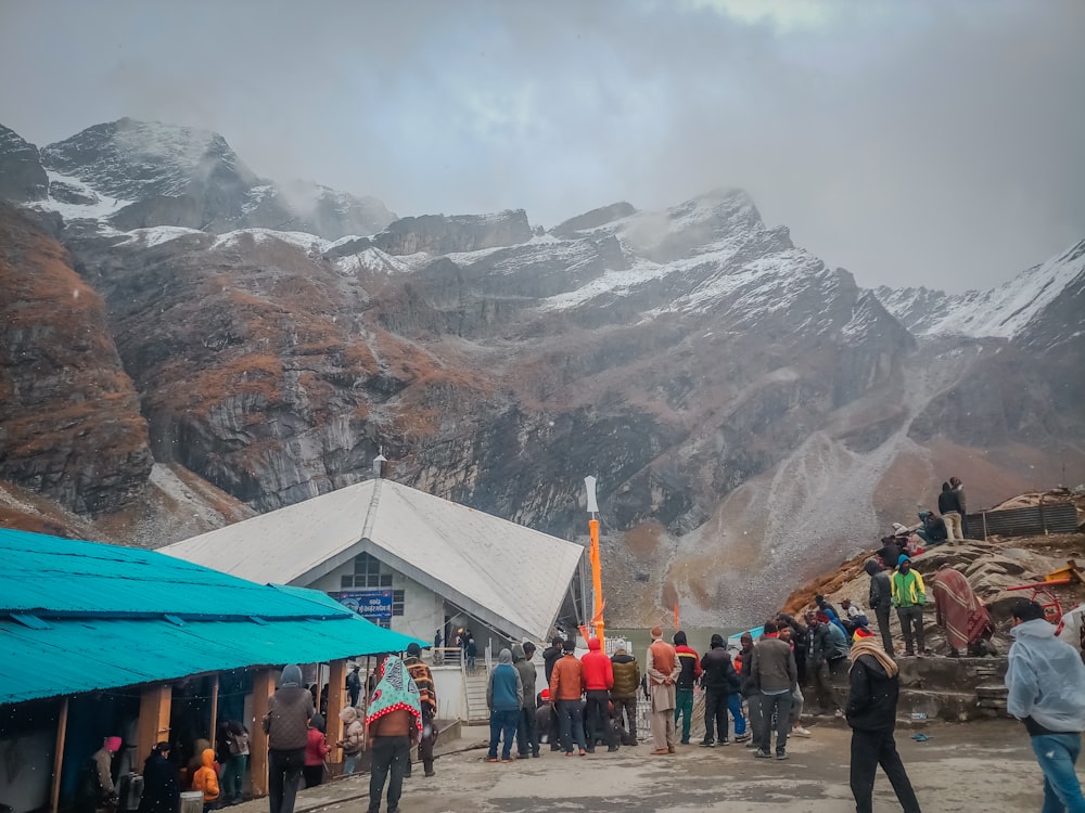 people walking on street near mountain during daytime