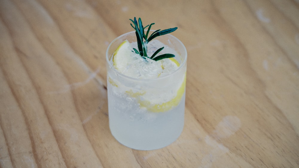 white liquid in clear drinking glass