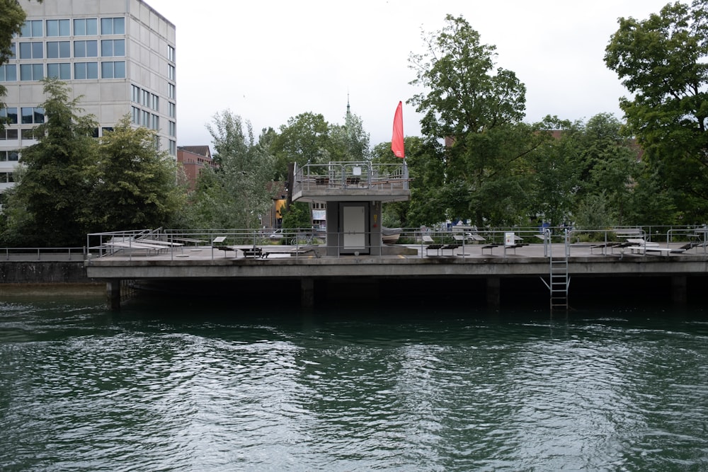 body of water near building during daytime