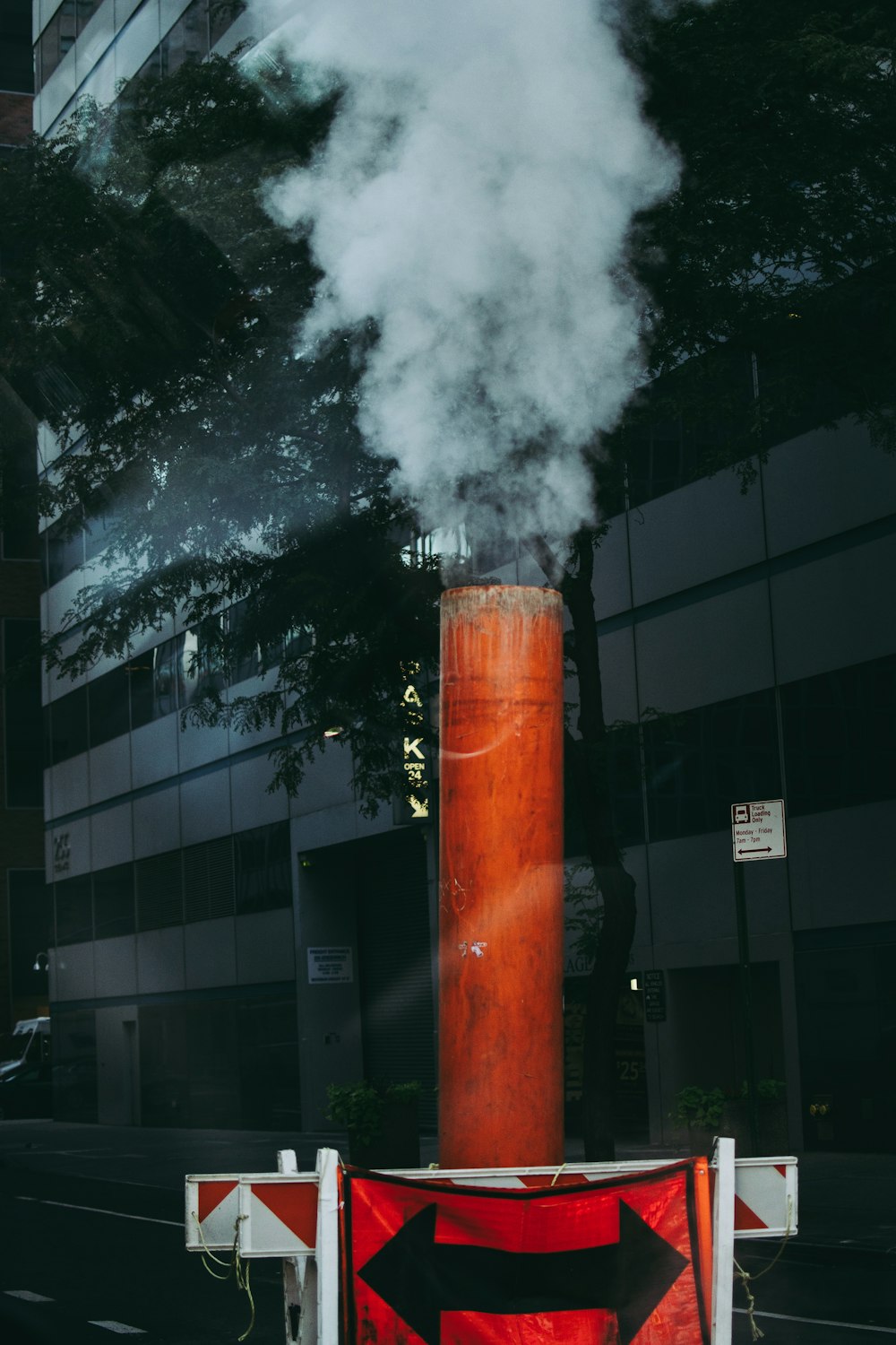 orange and black fire near building