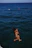 woman in black bikini top on water during daytime