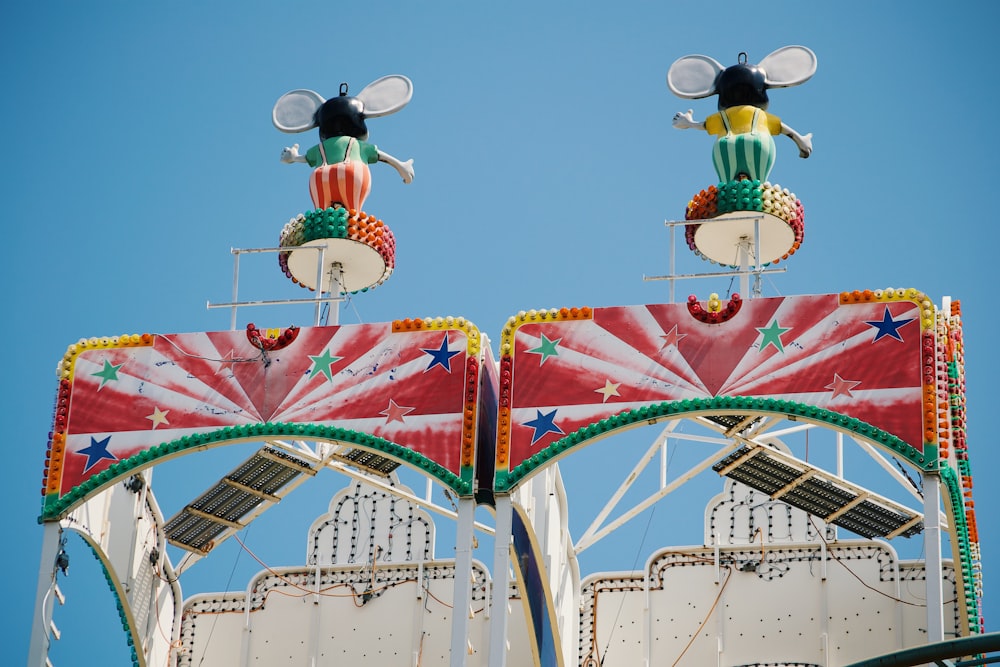 mickey mouse and minnie mouse themed park ride