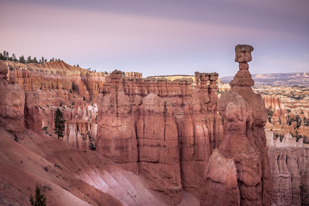 brown rock formation under blue sky during daytime