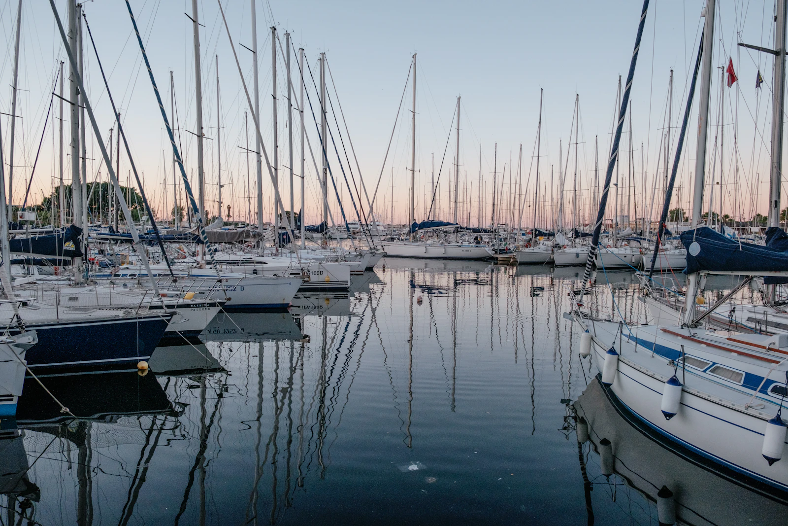 White sail boats on the sea during daytime