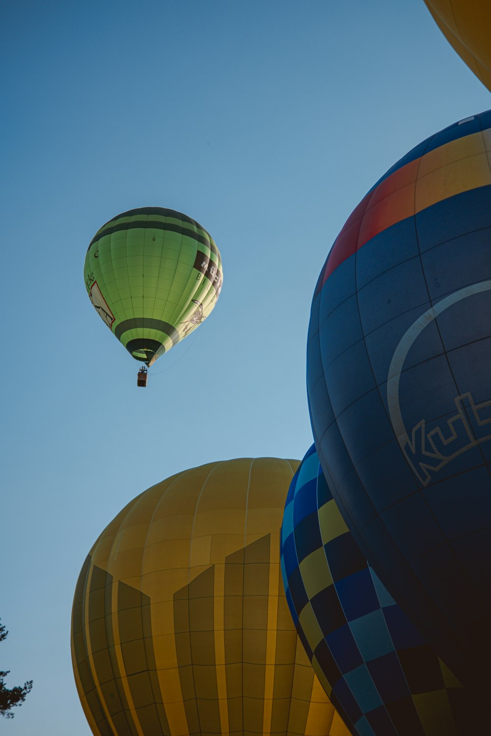 blue green and yellow hot air balloon