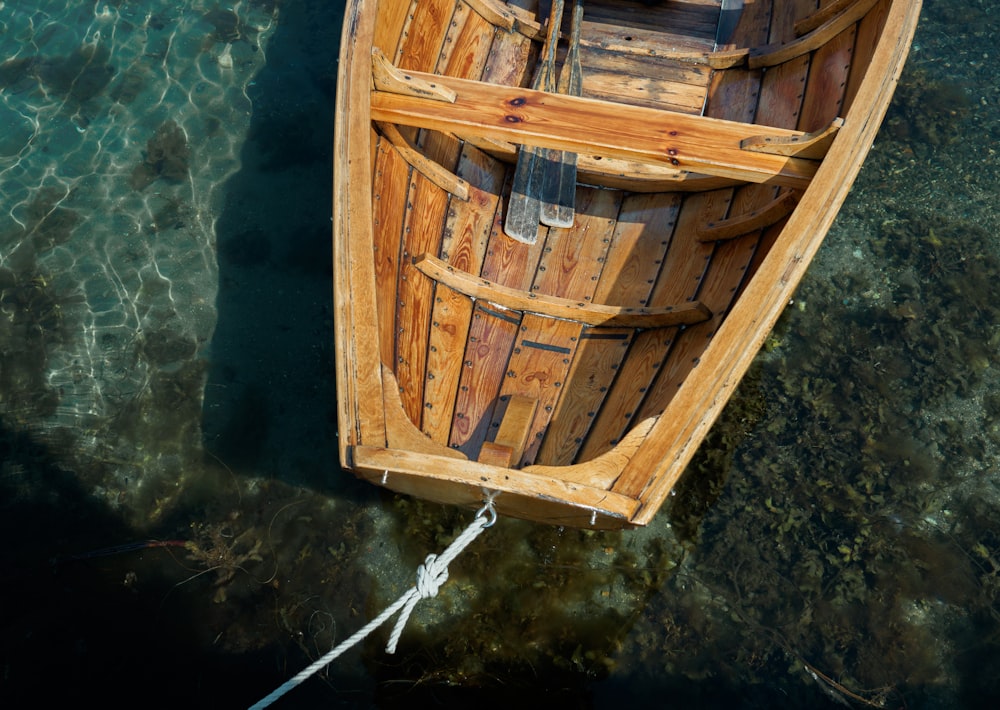 brown wooden boat on water