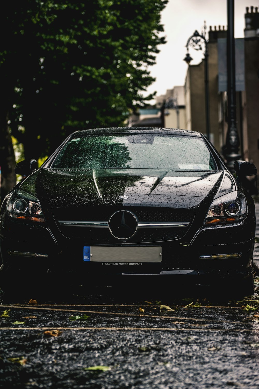 black bmw m 3 parked on road side during daytime