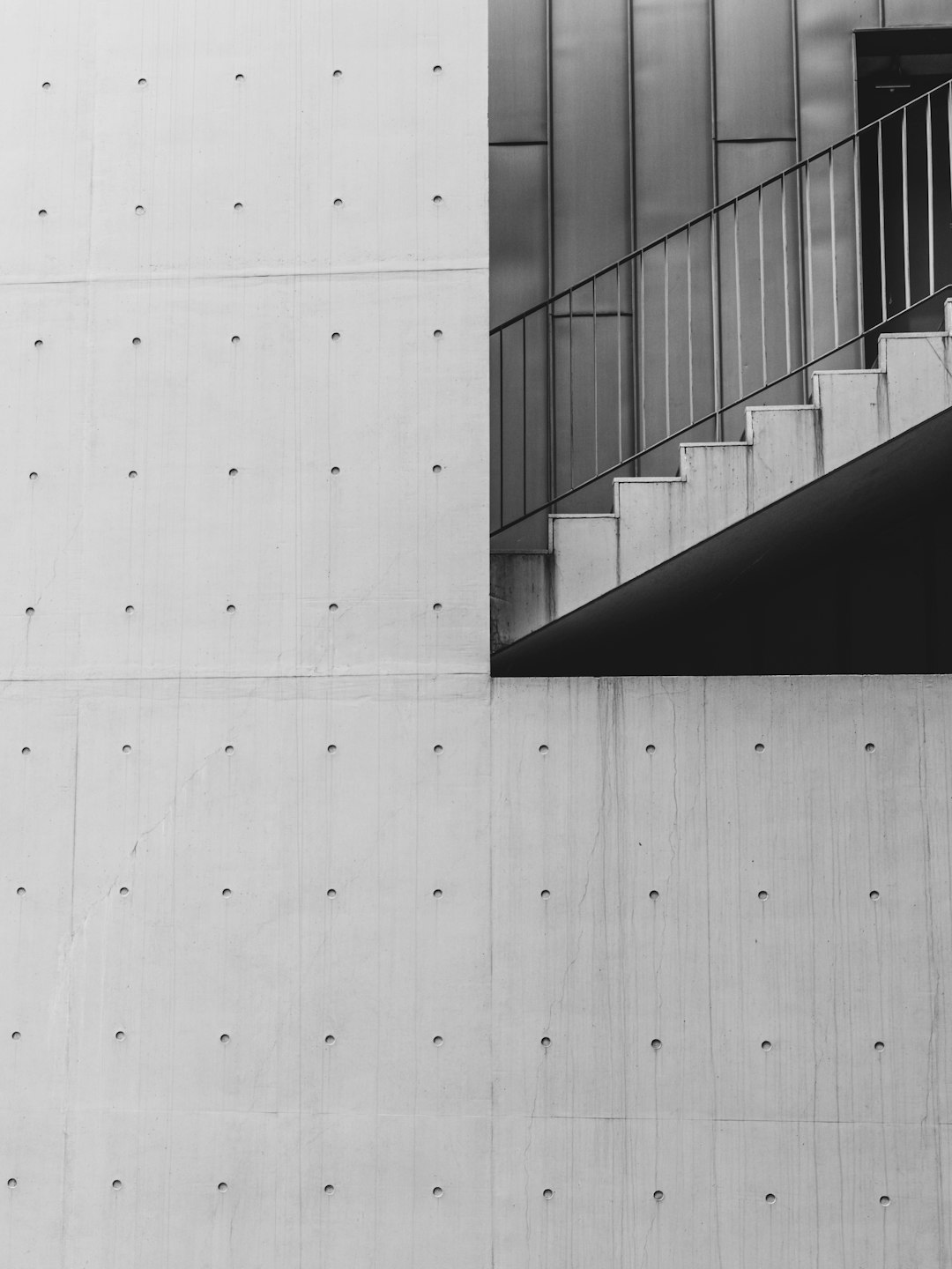 white concrete wall during daytime