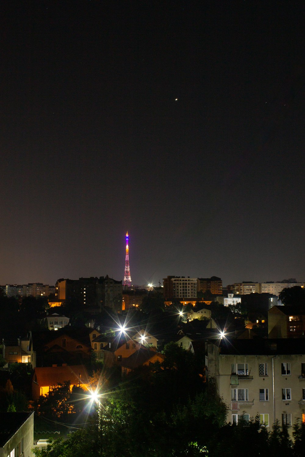 city skyline during night time