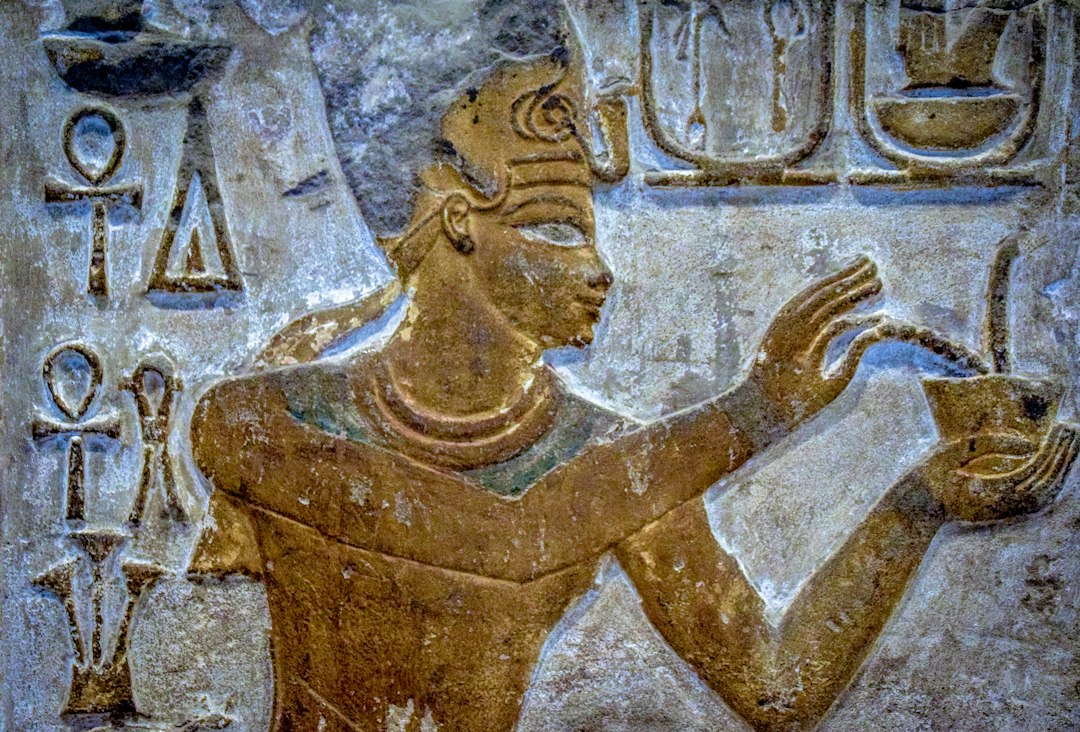 brown concrete statue of man, Egyptian Art…