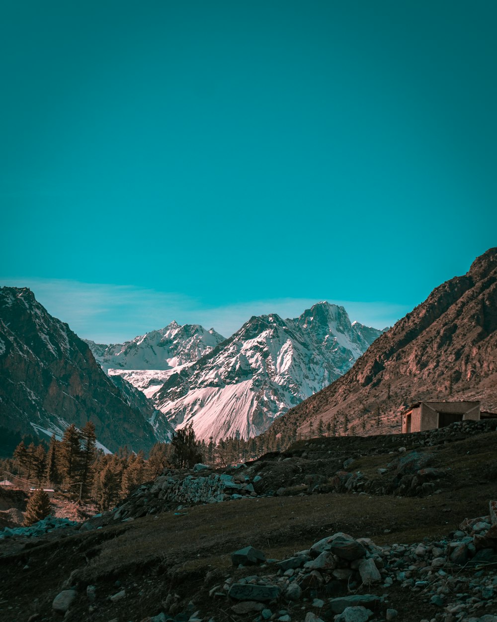 brown and white mountains under blue sky during daytime