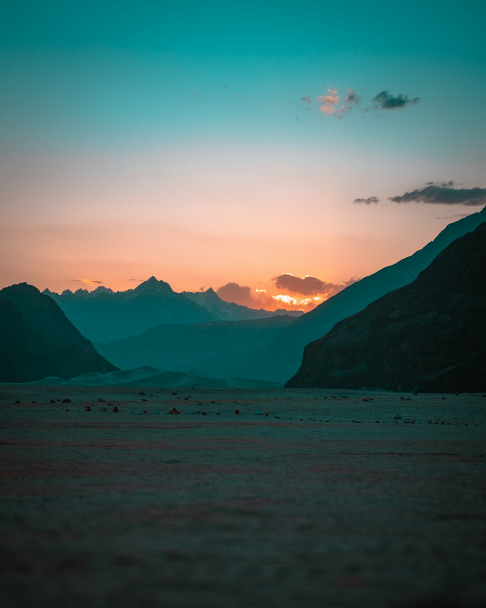 silhouette of mountains during sunset