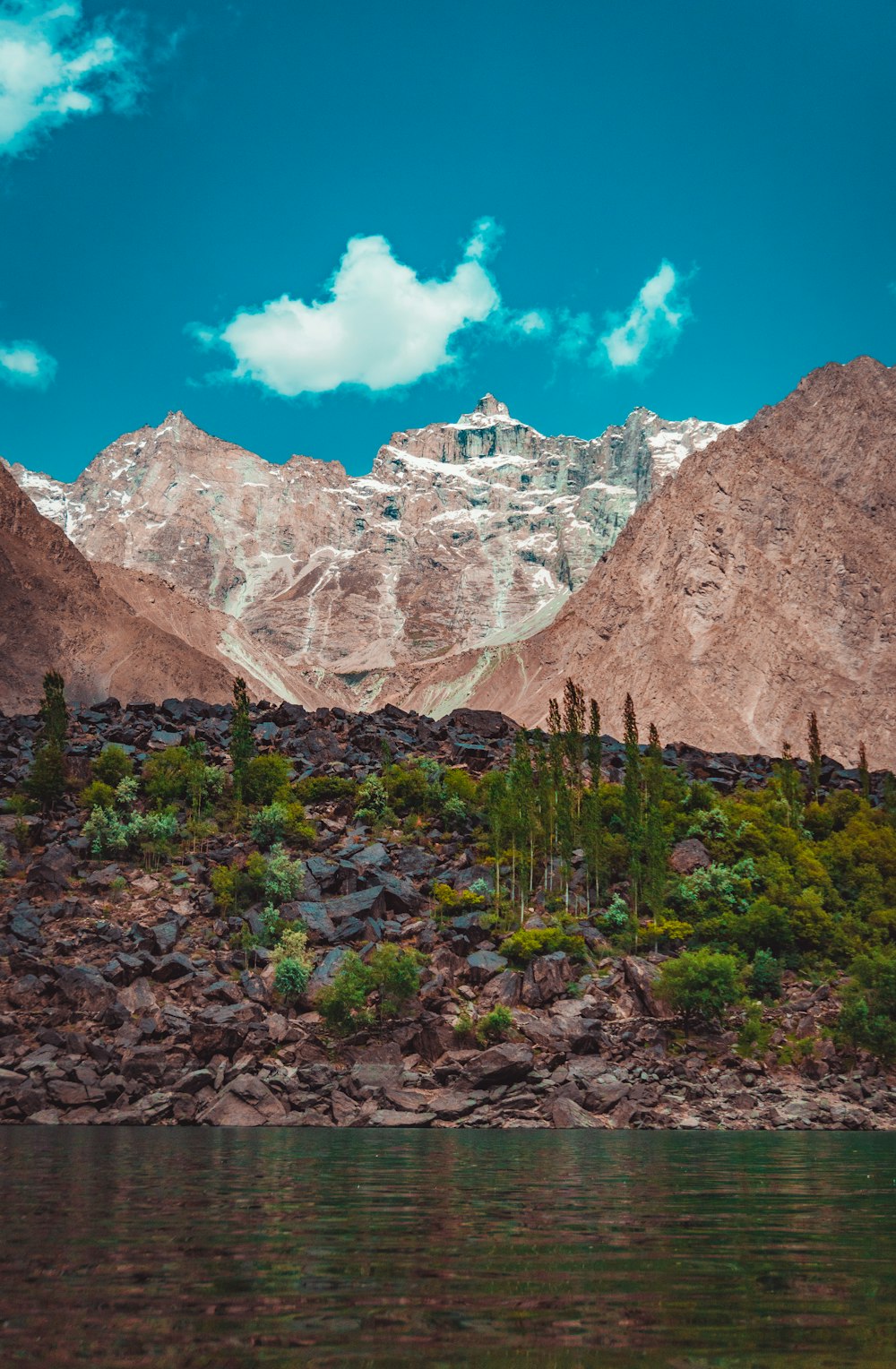 brown rocky mountain under blue sky during daytime