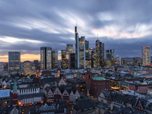 Frankfurt skyline with towers beside a river